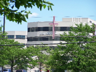 View of St Alexius from Poplar Creek Bike Trail